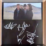 C36. U2 Autographed The Joshua Tree booklet. 